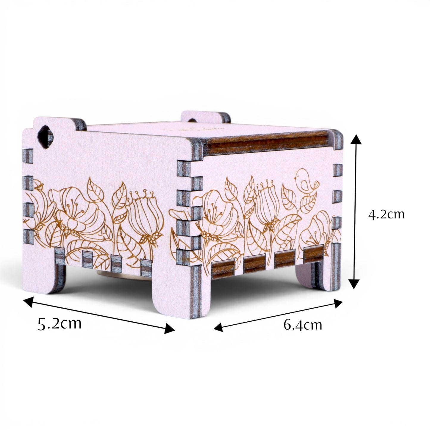 Measurements of Enchanted Music Boxes wind-up plywood music box featuring intricate floral and bird engravings on a light purple finish.