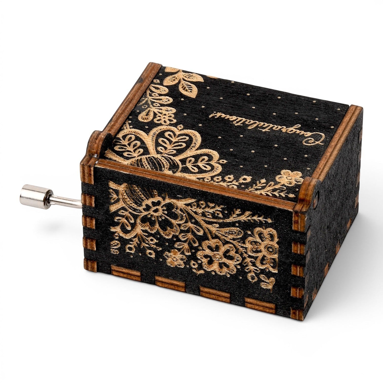 Enchanted Music Boxes hand-crank music box in black plywood with intricate gold folk art floral engravings.