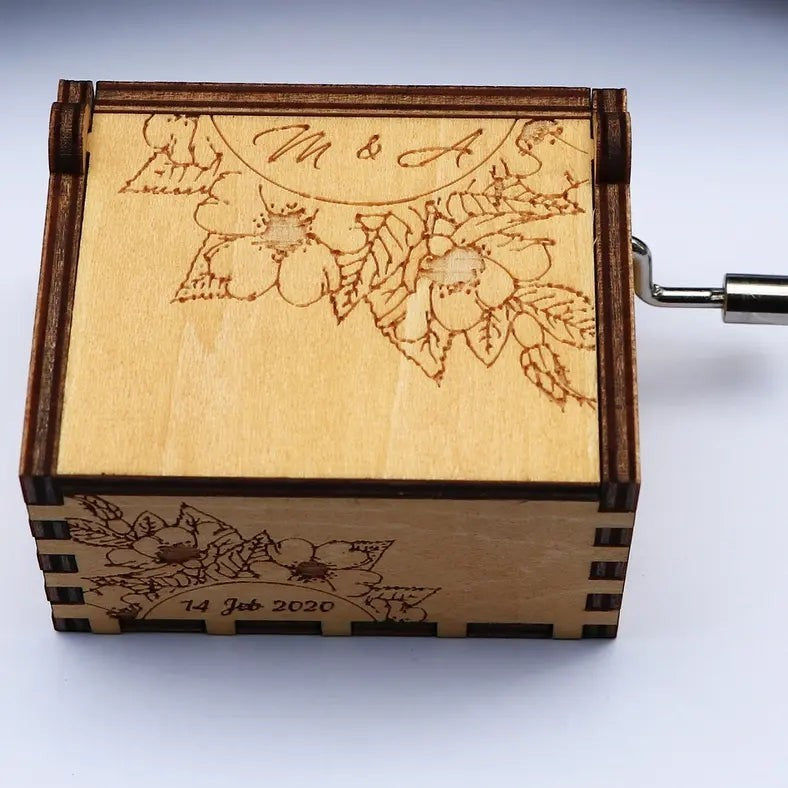 Enchanted Music Boxes cherry blossoms plywood hand-crank music box with custom engraved floral border and initials