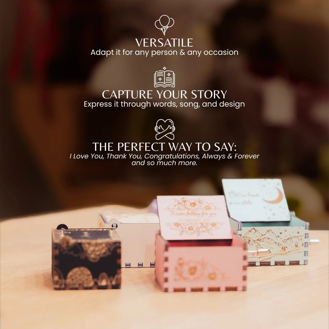 Enchanted Music Boxes cherry blossom plywood hand-crank music boxes with custom engravings and floral designs