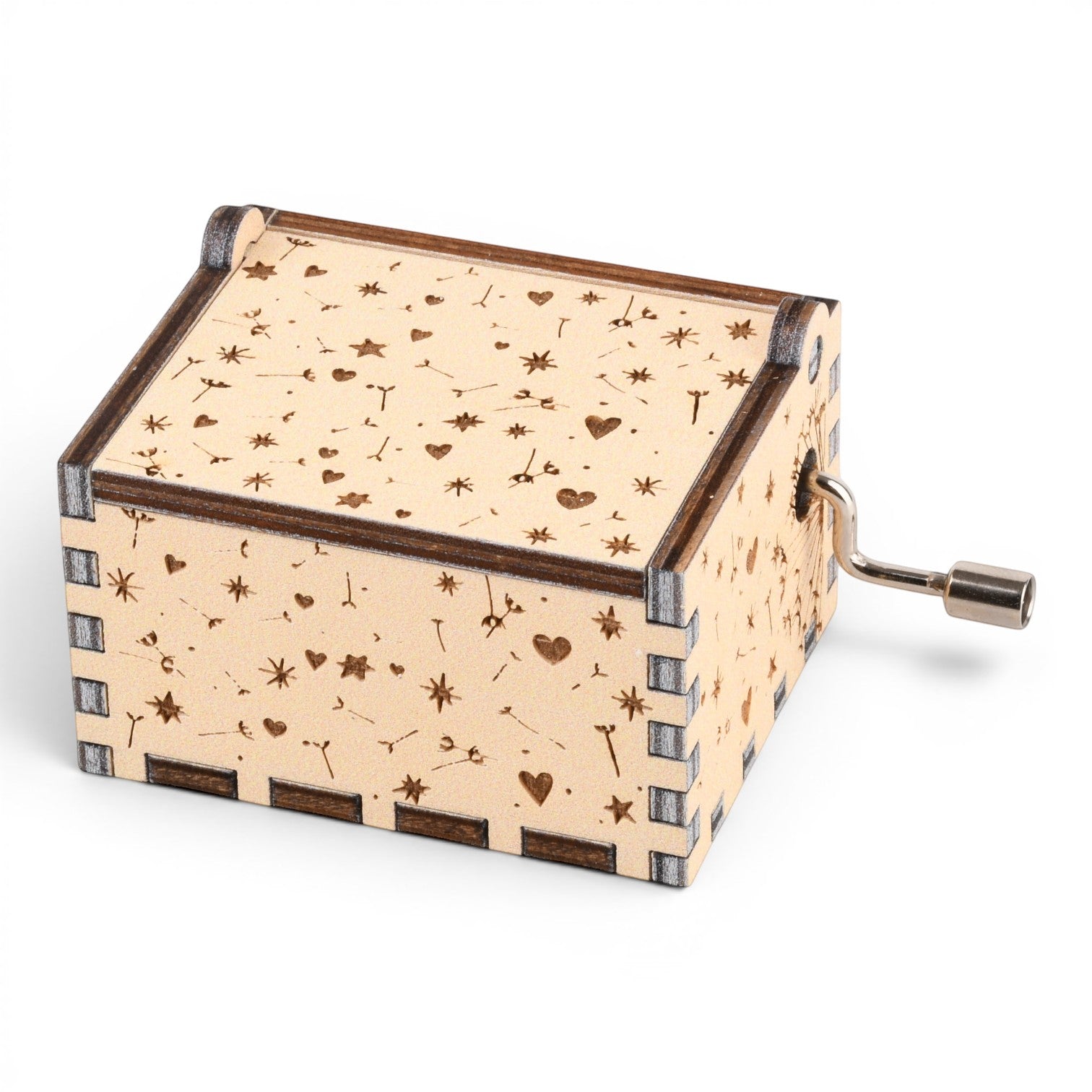 Enchanted Music Boxes hand-crank music box in light plywood with laser-engraved dandelion, heart, and star patterns.