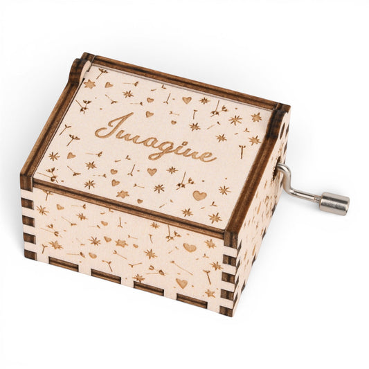 Enchanted Music Boxes plywood hand-crank music box featuring laser-engraved dandelion seeds, hearts, and Imagine text.
