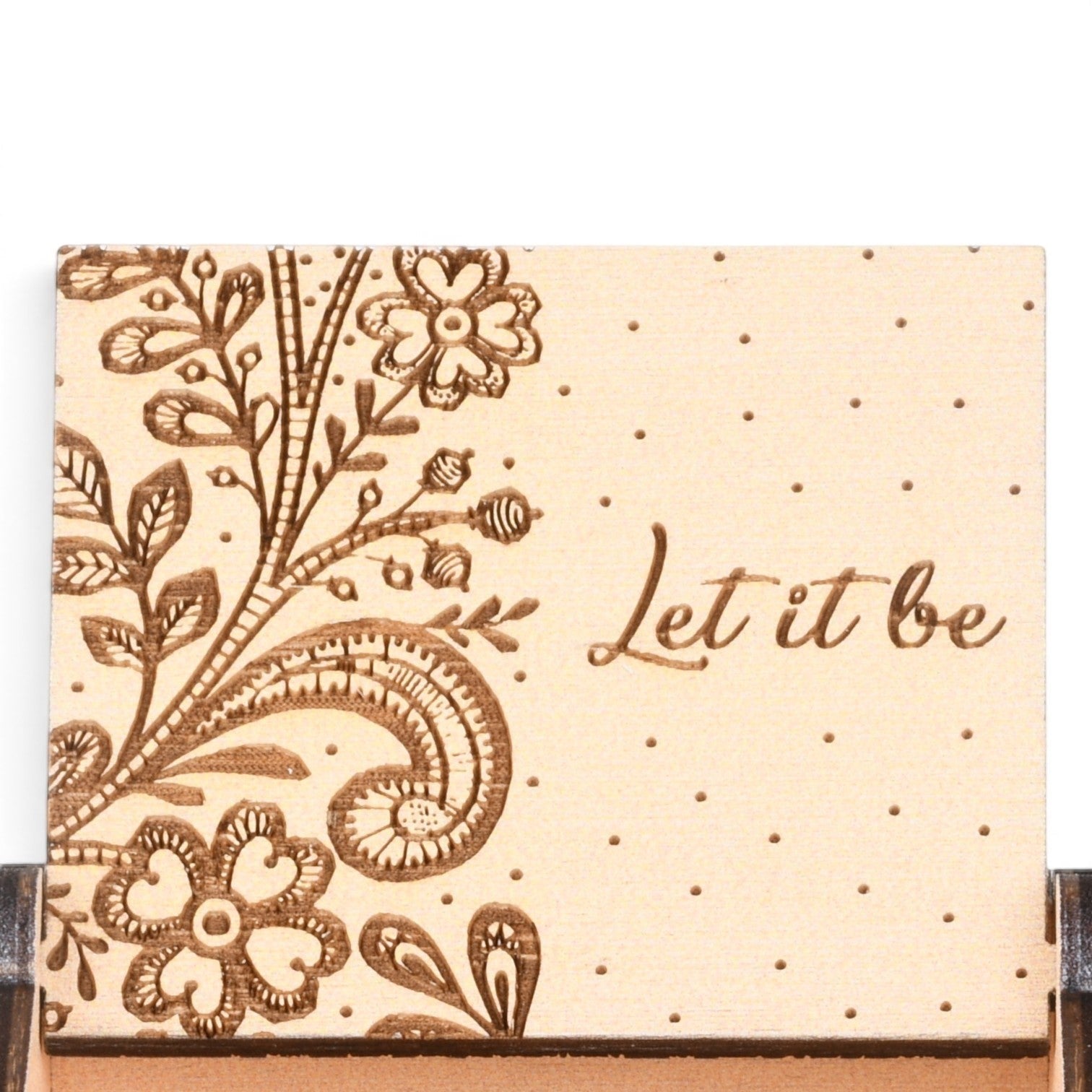 Enchanted Music Boxes plywood music box lid with engraved folk art flowers, dotted patterns, and Let it be text.