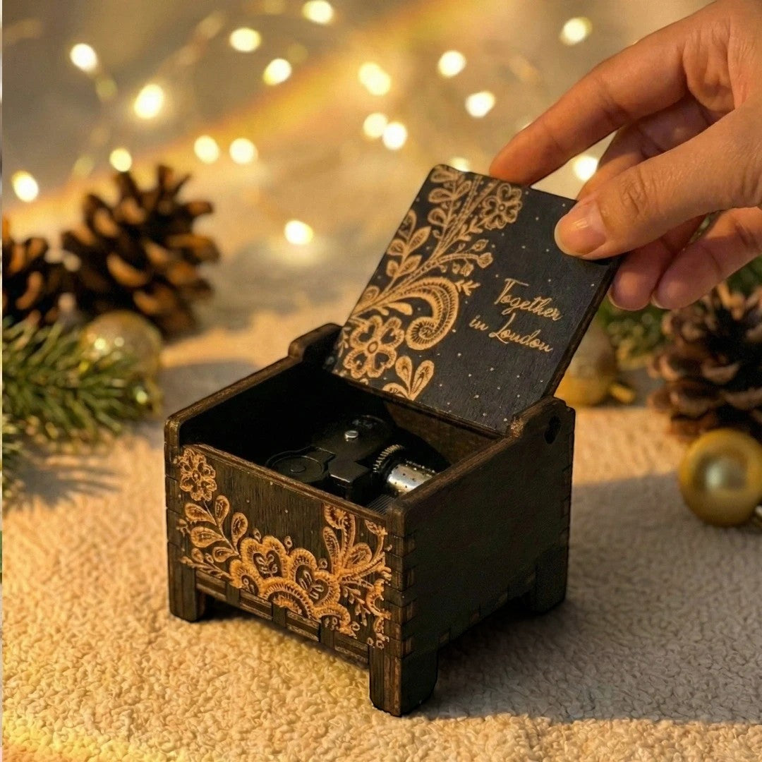 Enchanted Music Boxes ethnic nature plywood music box with floral laser-engraved lid and custom text in a festive setting