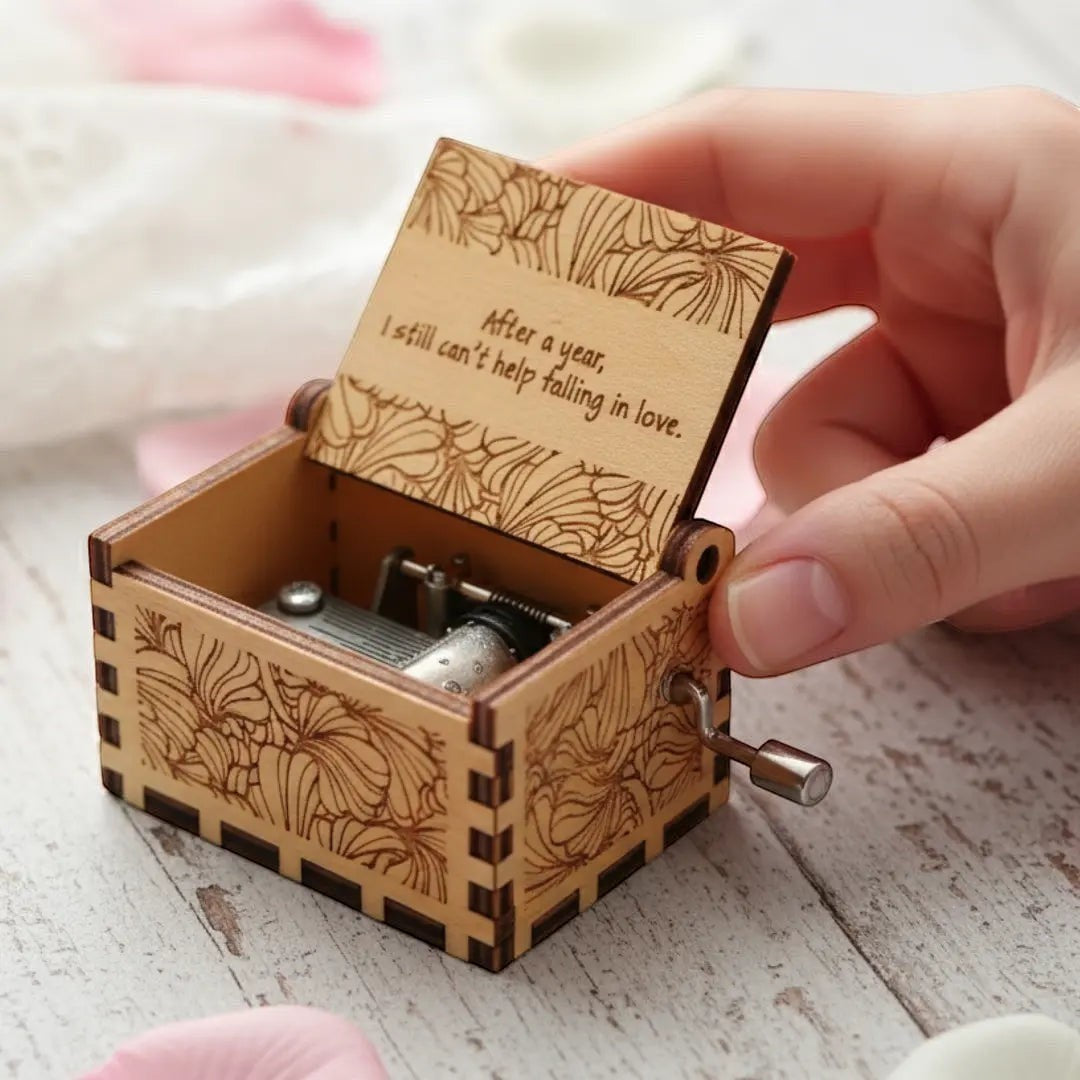 Enchanted Music Boxes hand-crank plywood music box with laser-engraved floral patterns and custom lid inscription