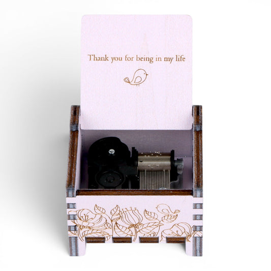 Open Enchanted Music Boxes plywood wind-up music box with floral engraving and custom Thank you message on the open lid.