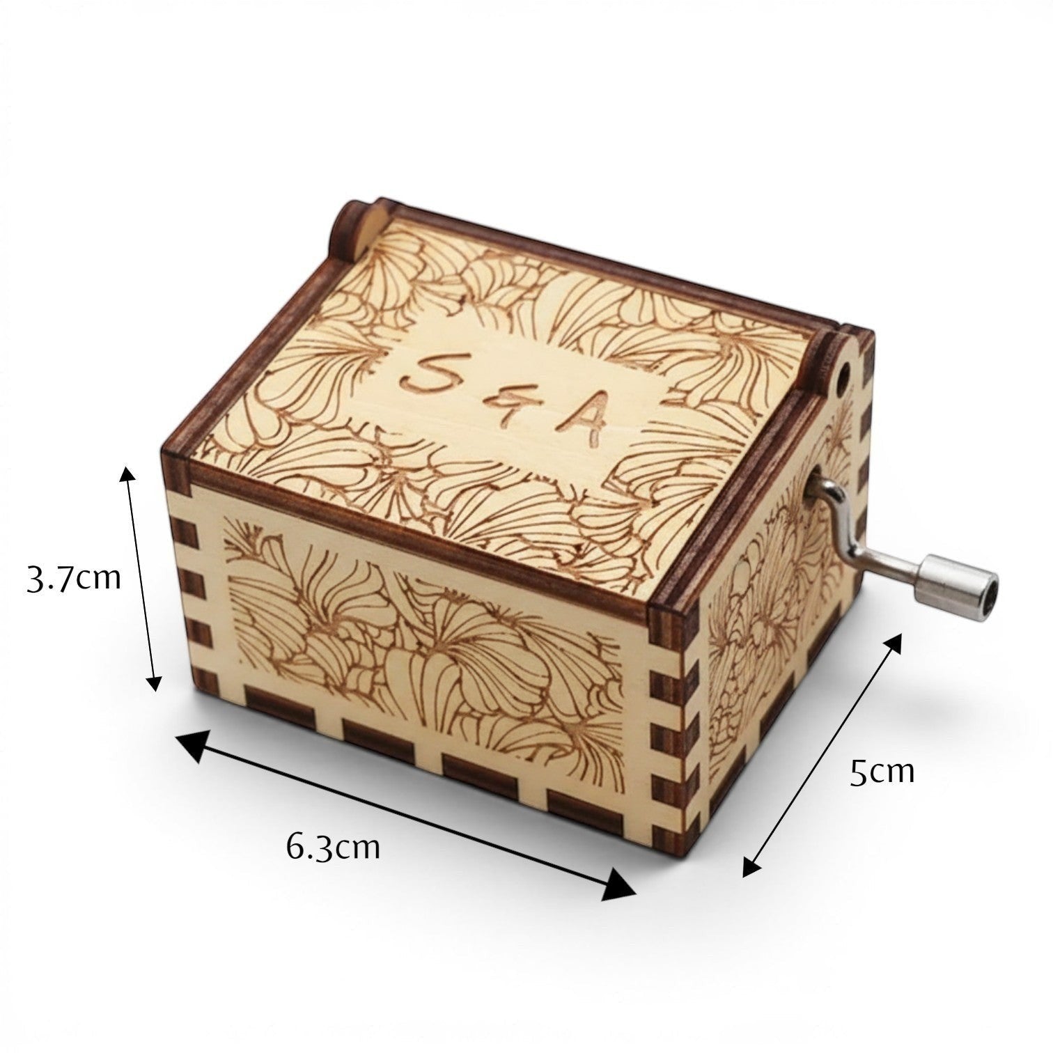 Enchanted Music Boxes laser-engraved plywood hand-crank music box with floral patterns and custom initials on the lid.