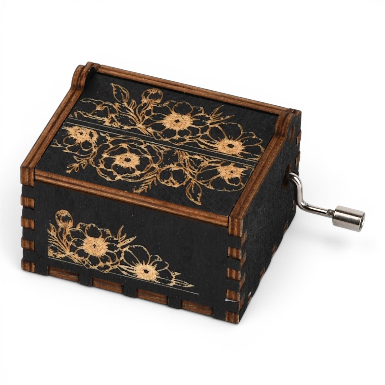 Enchanted Music Boxes hand-crank music box in black plywood with intricate vintage-style floral engravings.