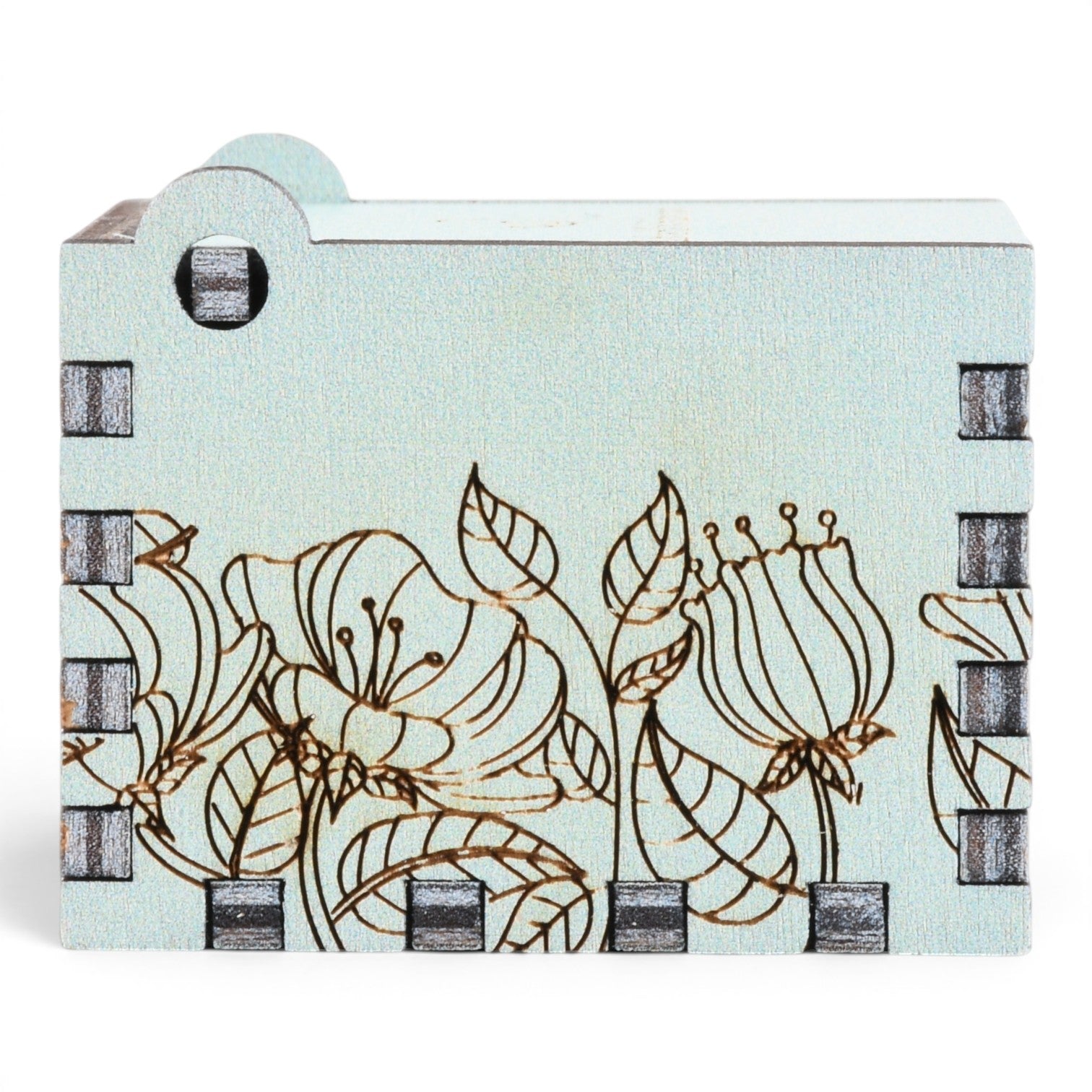 Enchanted Music Boxes light blue plywood music box featuring delicate laser-engraved floral and leaf illustrations.
