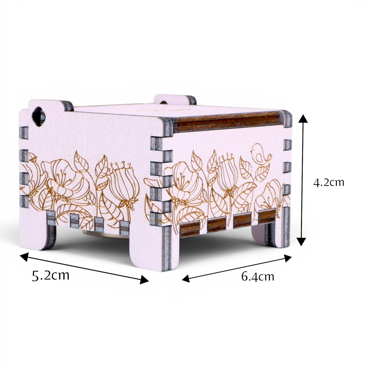 Measurements of Enchanted Music Boxes wind-up plywood music box featuring intricate floral and bird engravings on a light purple finish.