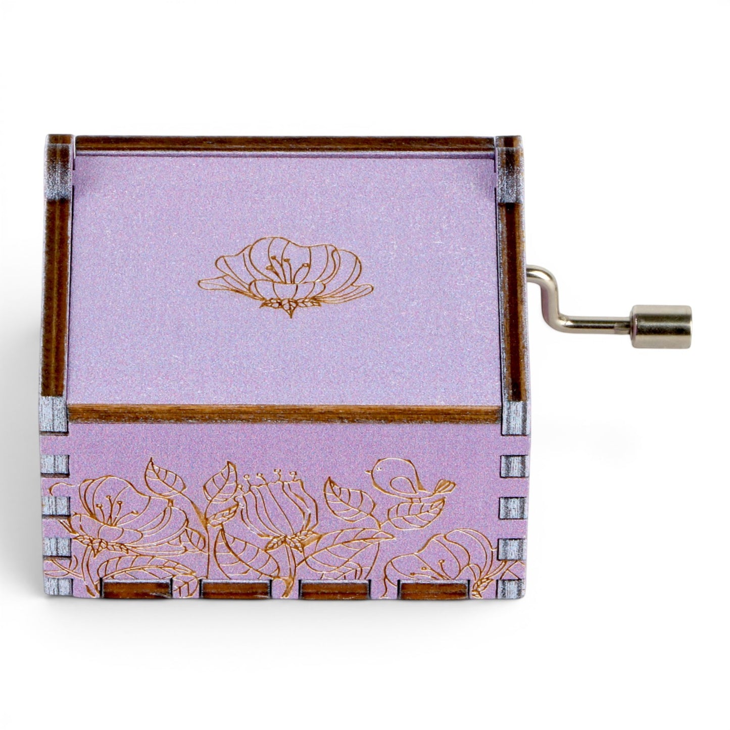 Enchanted Music Boxes hand-crank music box in lavender plywood with gold floral and bird engraving.