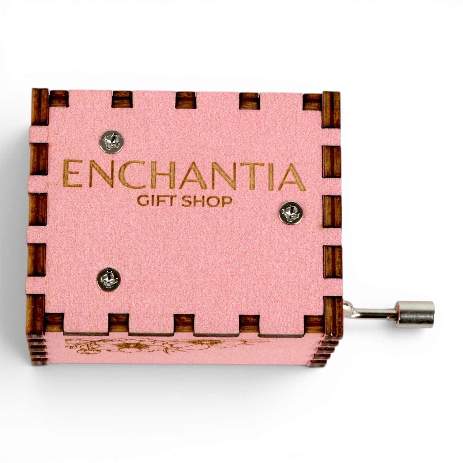 Enchanted Music Boxes pink plywood hand-crank music box with floral engravings and metal handle