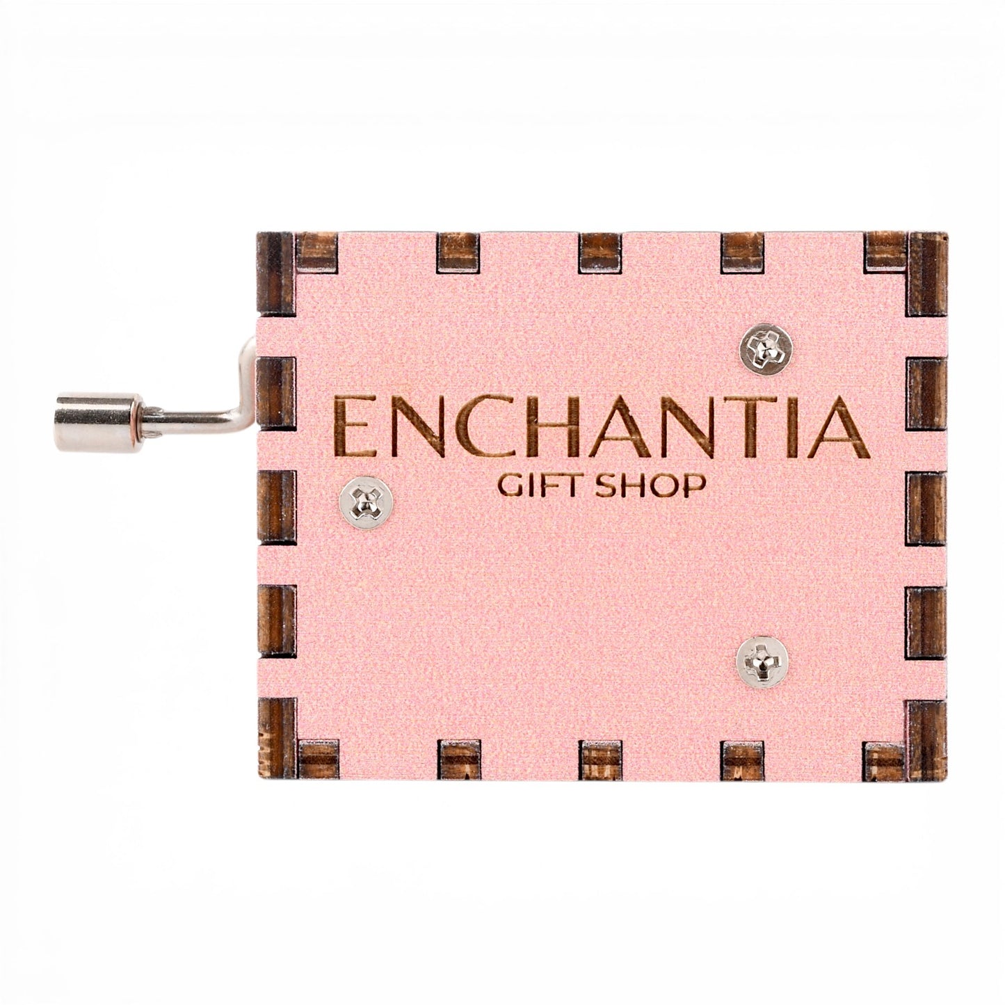 Enchanted Music Boxes hand-crank music box in pink plywood with metal handle and engraved Enchantia logo on top