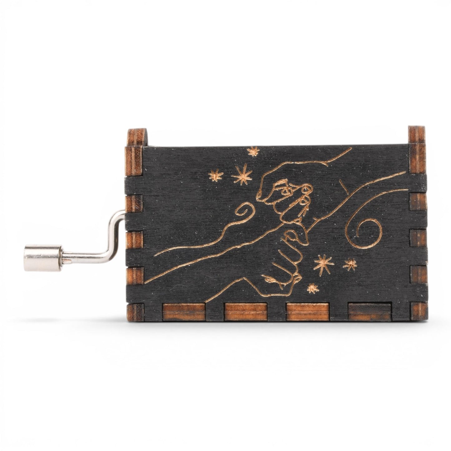 Enchanted Music Boxes hand-crank music box in black plywood with a laser-engraved pinky promise design on the side.