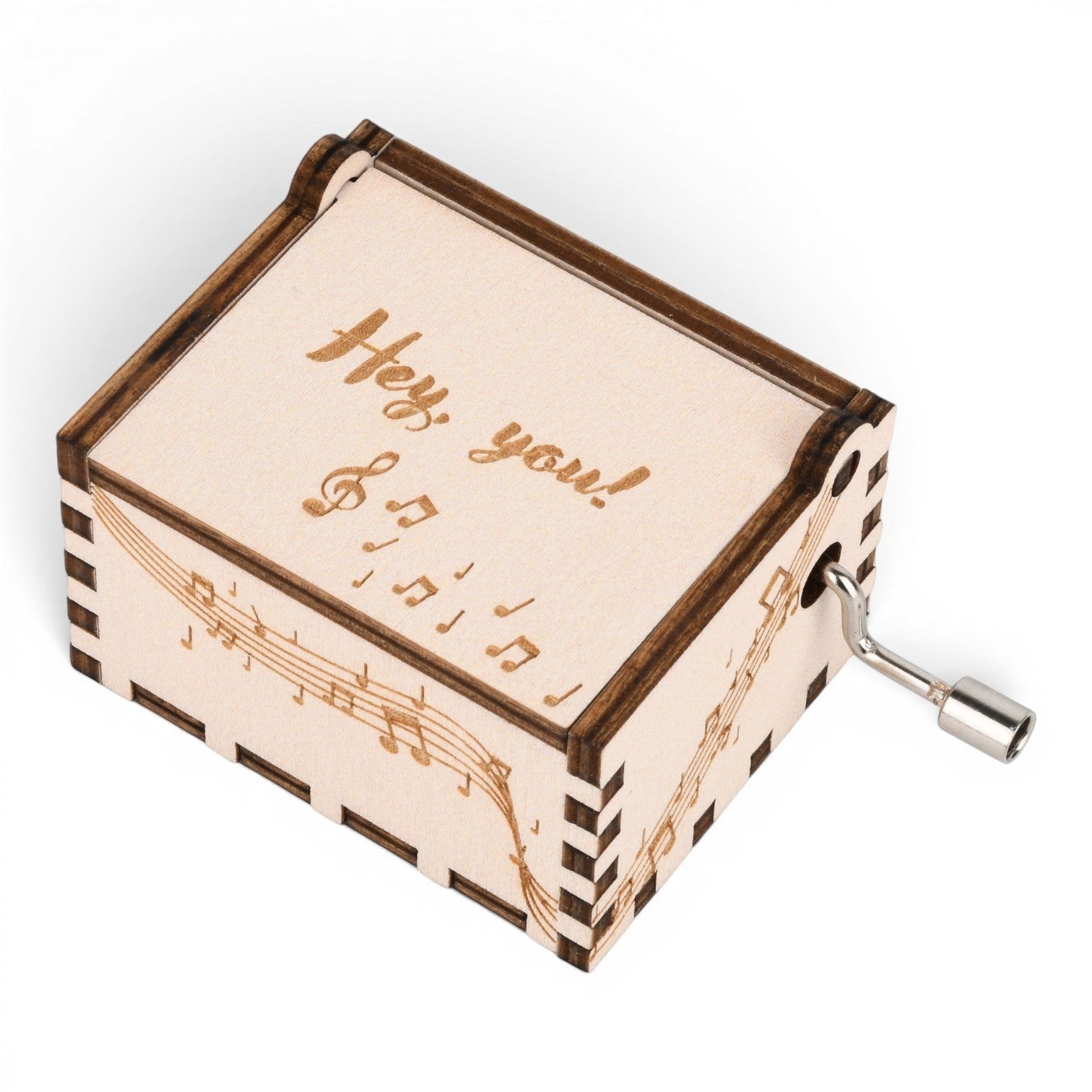 Enchanted Music Boxes hand-crank plywood music box with laser-engraved musical notes and Hey you! text on the lid.