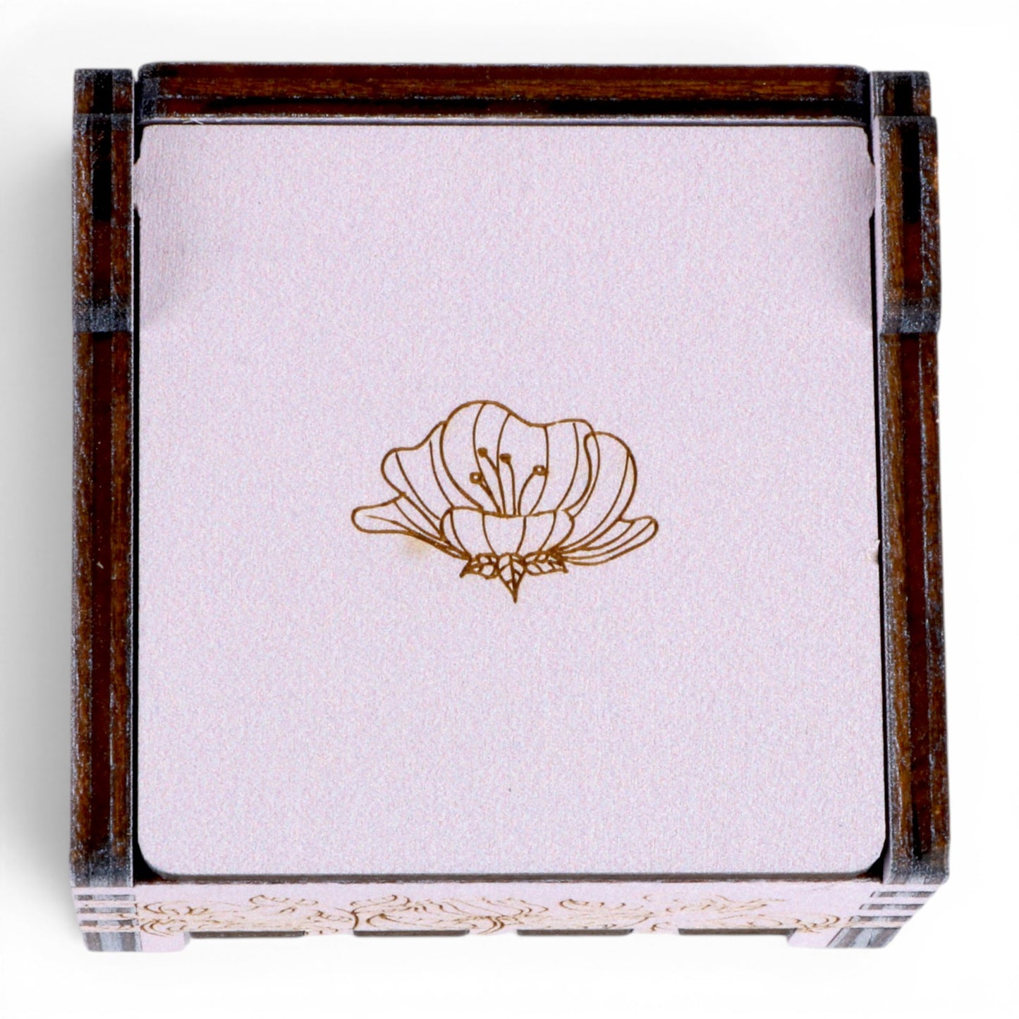 Top view of Enchanted Music Boxes plywood wind-up music box with a delicate laser-engraved flower design on the lid.