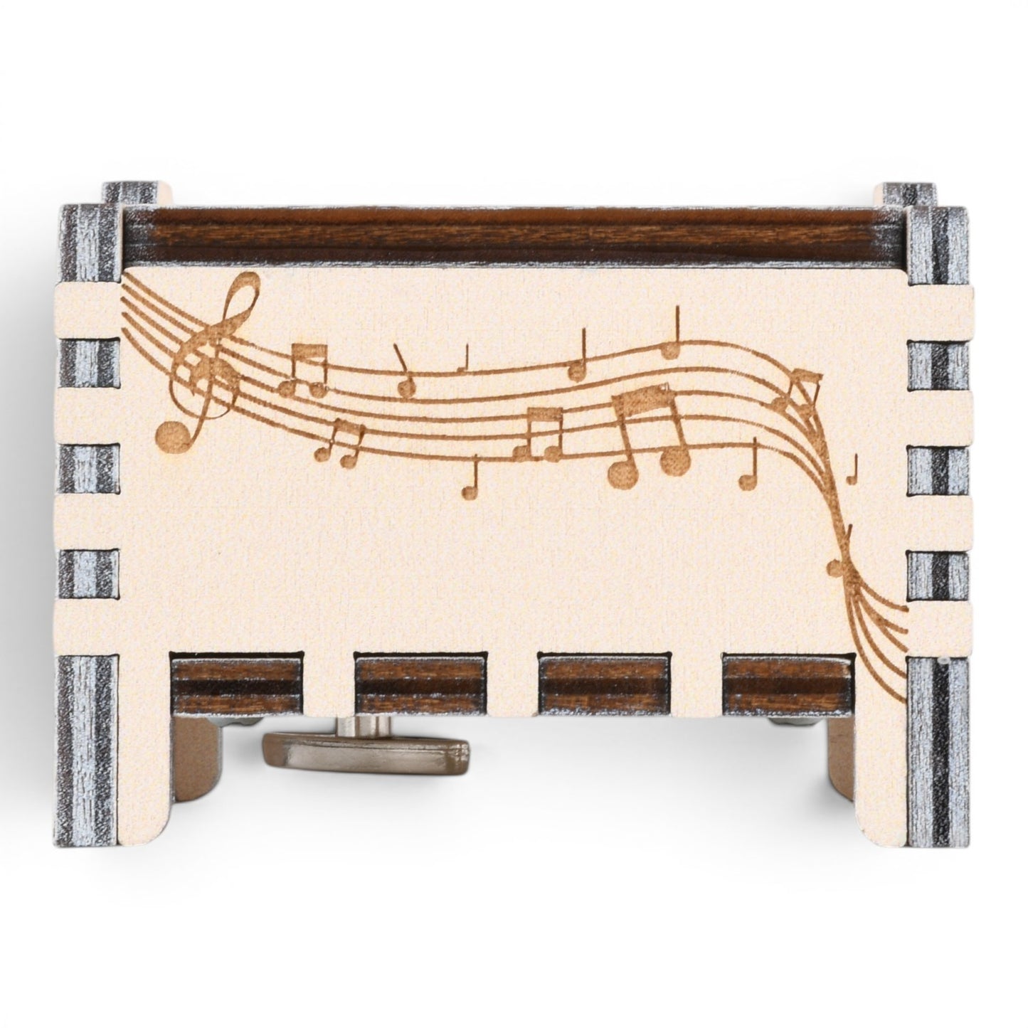 Enchanted Music Boxes plywood wind-up music box featuring laser-engraved musical notes and staves on a light wood panel