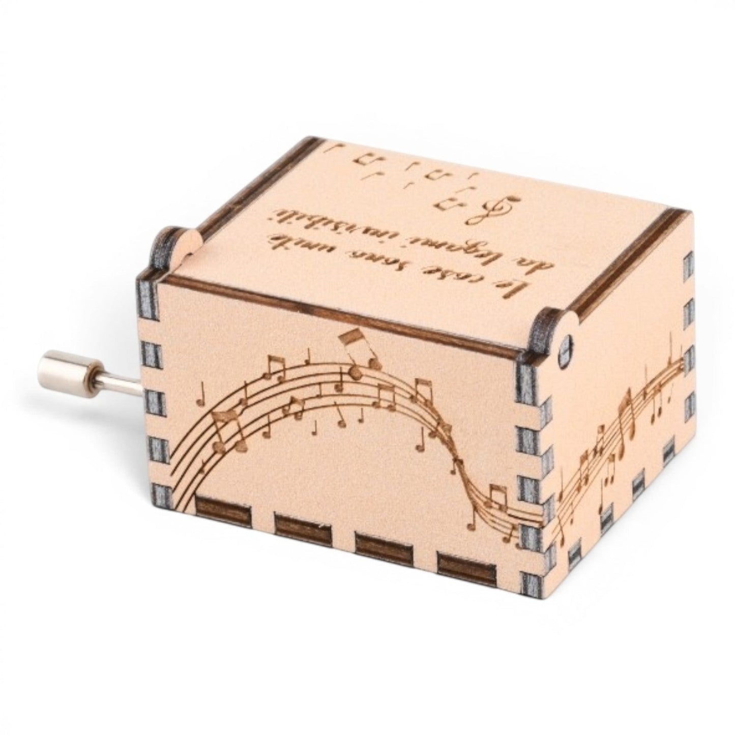Enchanted Music Boxes hand-crank music box made of light plywood with engraved musical staves and cursive text.