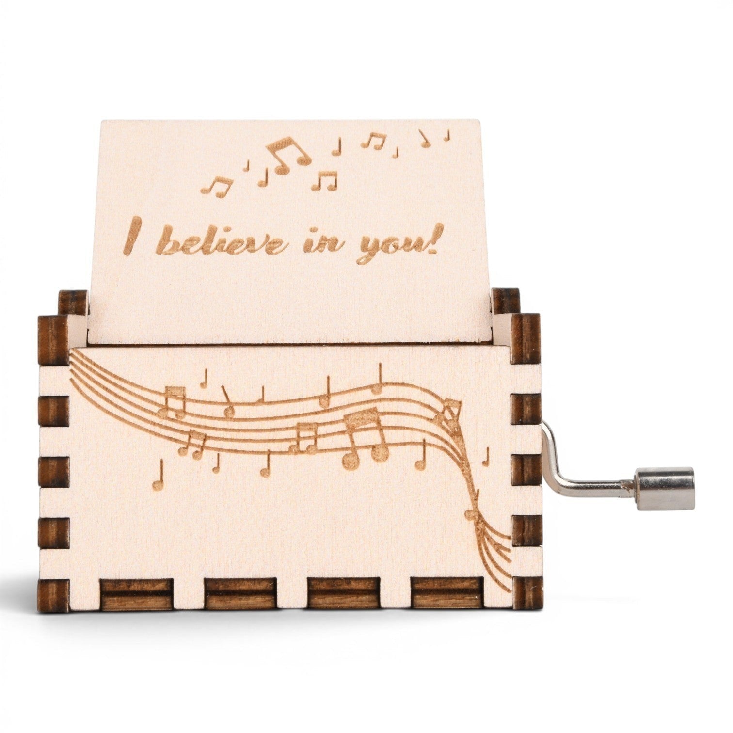 Enchanted Music Boxes hand-crank plywood music box with engraved music notes and I believe in you text on the lid.