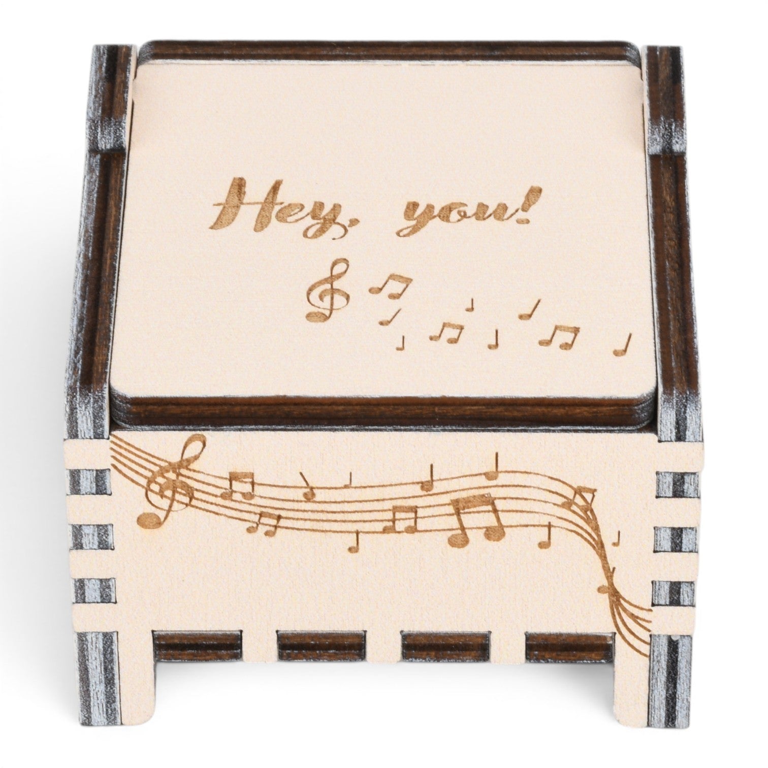 Enchanted Music Boxes plywood music box with engraved musical notes and Hey you text on the lid.