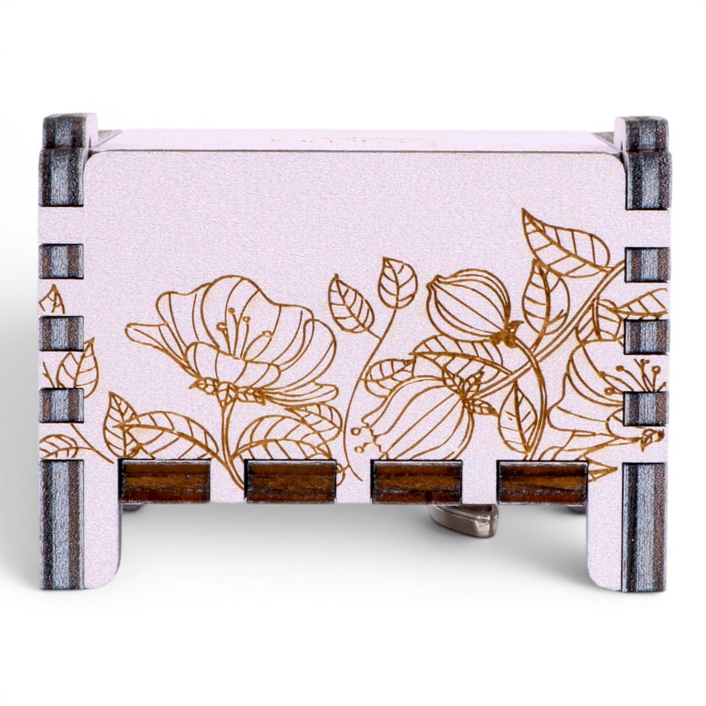 Back view of Enchanted Music Boxes wind-up music box in light purple plywood with intricate gold floral engraving on the side.