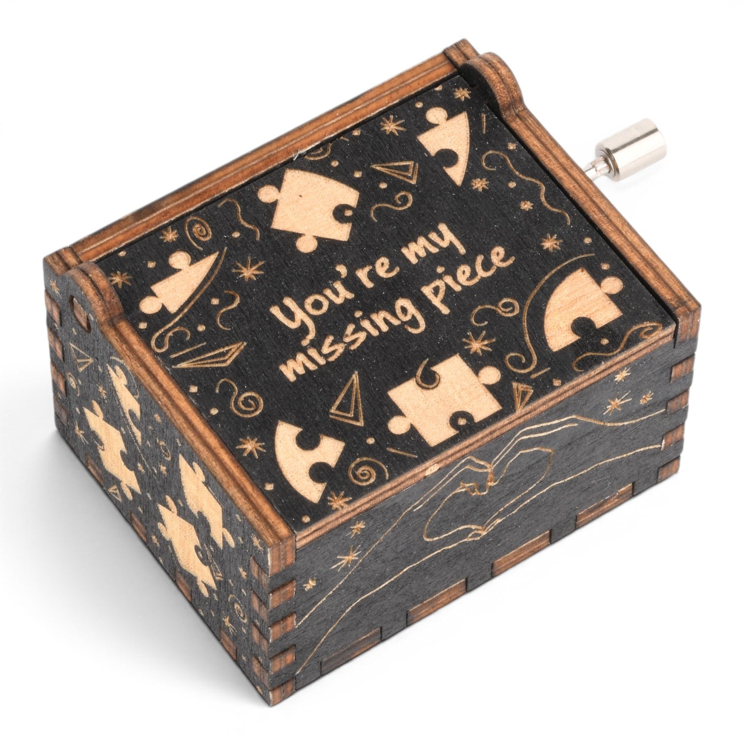 Enchanted Music Boxes black plywood hand-crank music box with puzzle piece engravings and You're my missing piece text