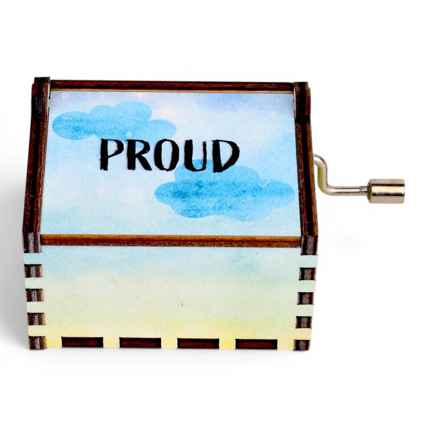Enchanted Music Boxes rainbow hand-crank music box in plywood with watercolour clouds and Proud text on the lid