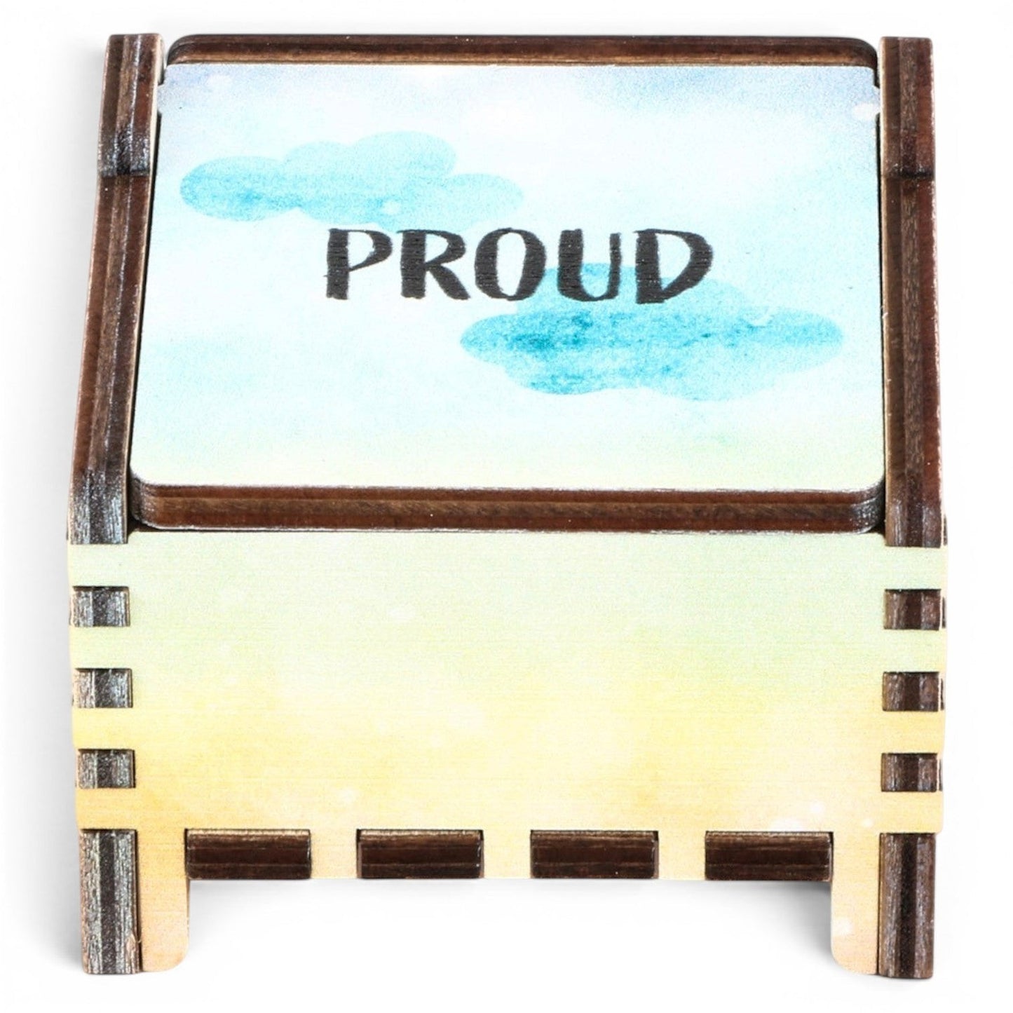 Enchanted Music Boxes rainbow wind-up music box in plywood with watercolour sky design and Proud engraving on lid