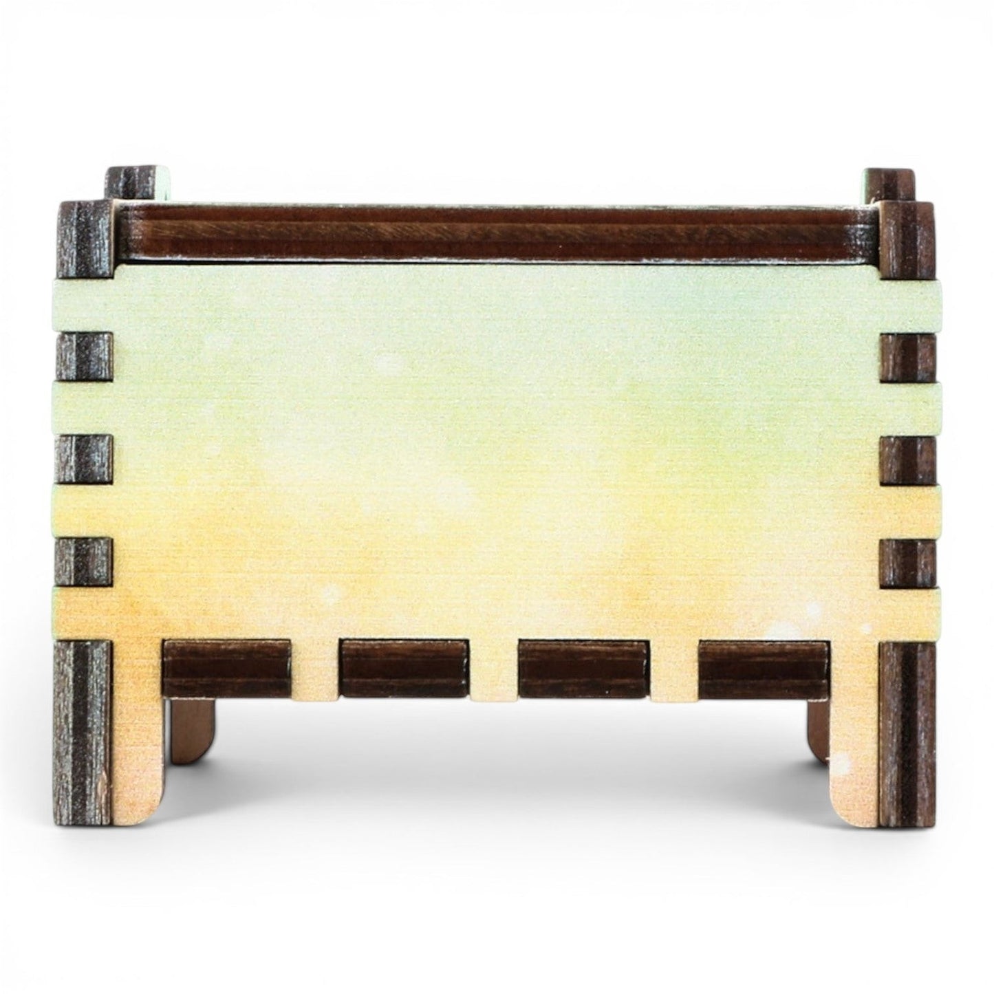 Enchanted Music Boxes rainbow plywood wind-up music box with a watercolour gradient finish on a white background