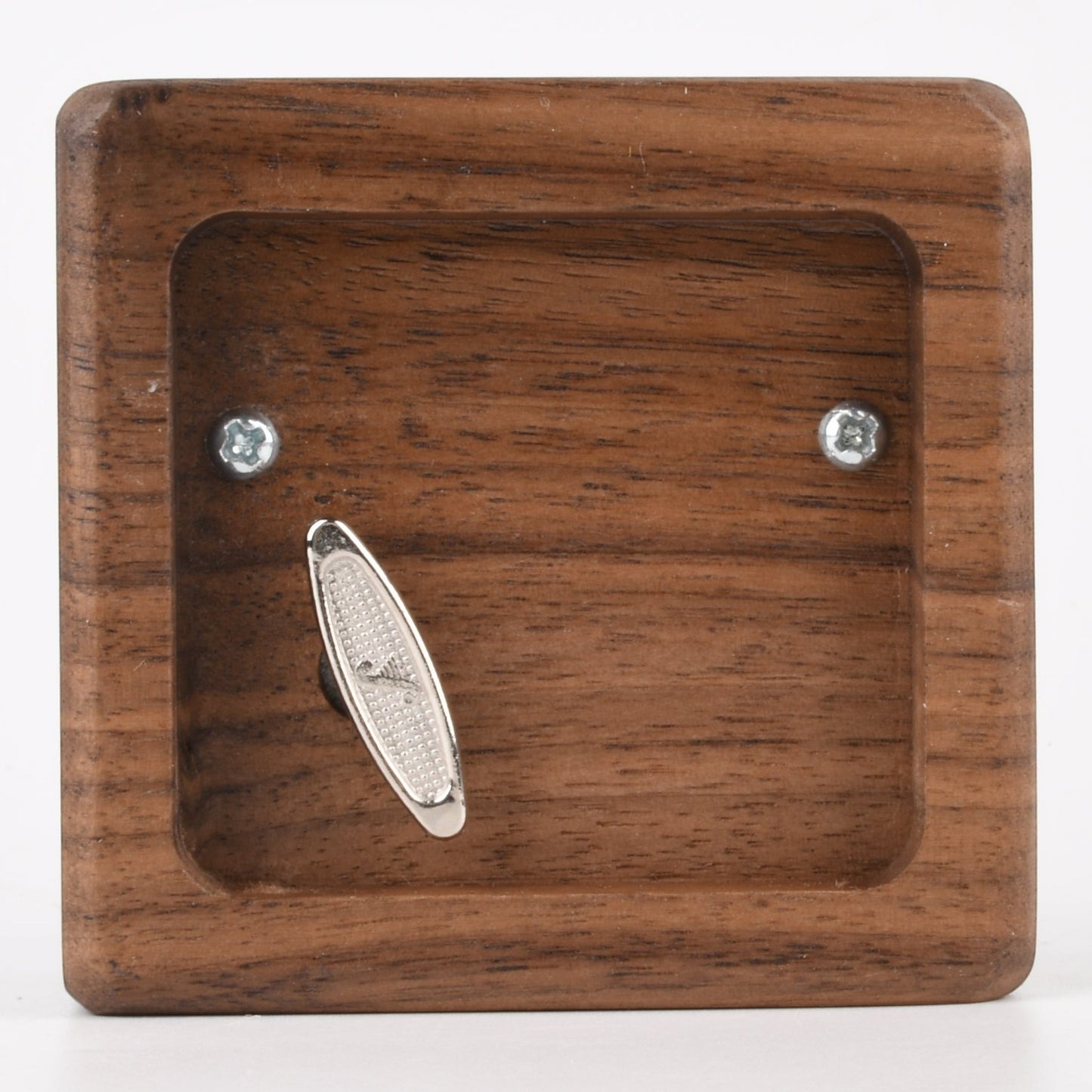 Enchanted Music Boxes square wooden wind-up music box showing the metal winding key on the underside