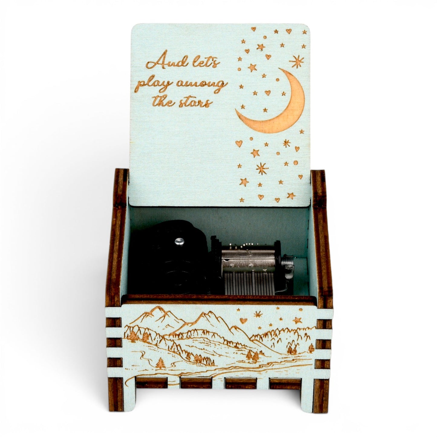 Open Enchanted Music Boxes teal wooden wind-up music box with engraved starry night sky, crescent moon, and mountains.