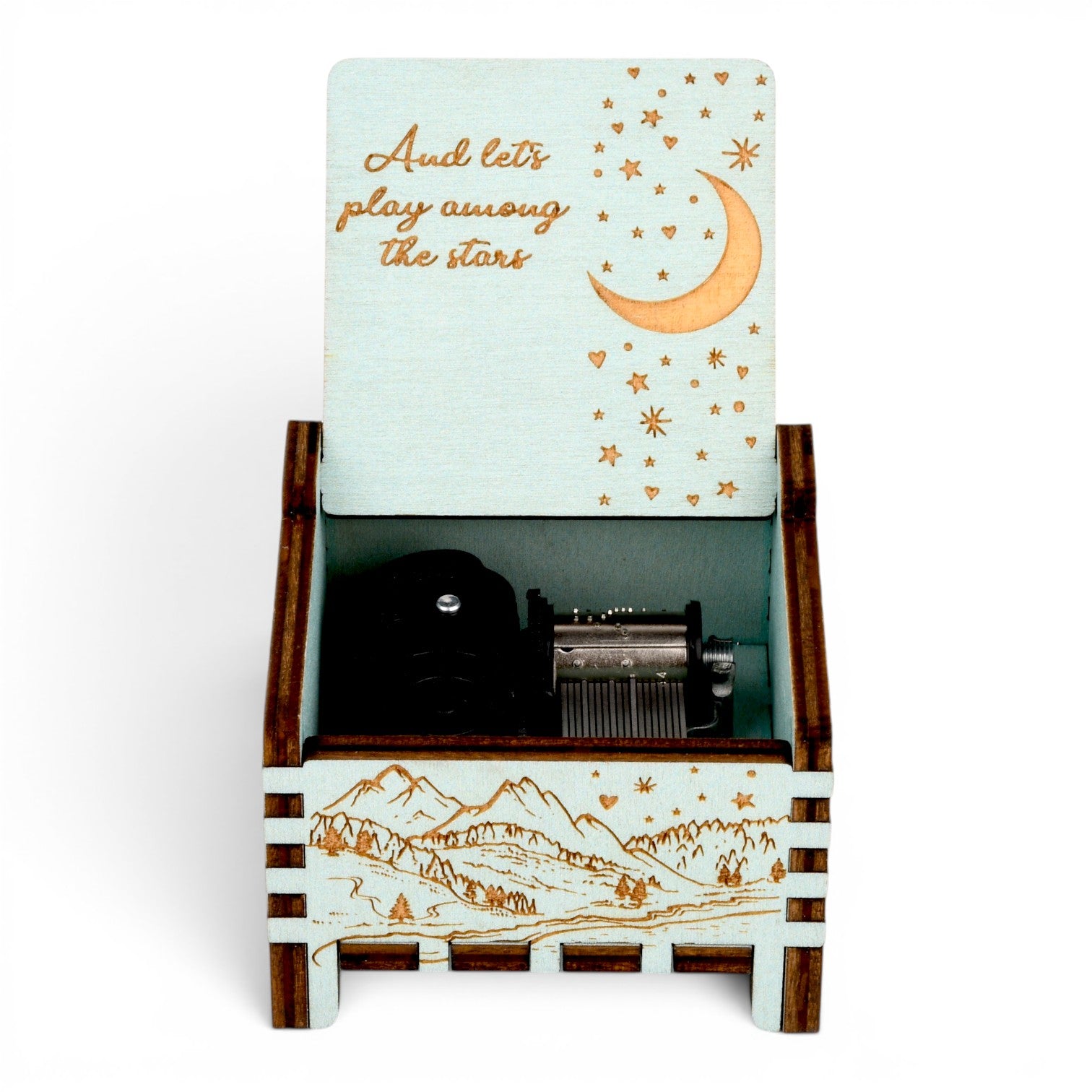 Open Enchanted Music Boxes teal wooden wind-up music box with engraved starry night sky, crescent moon, and mountains.