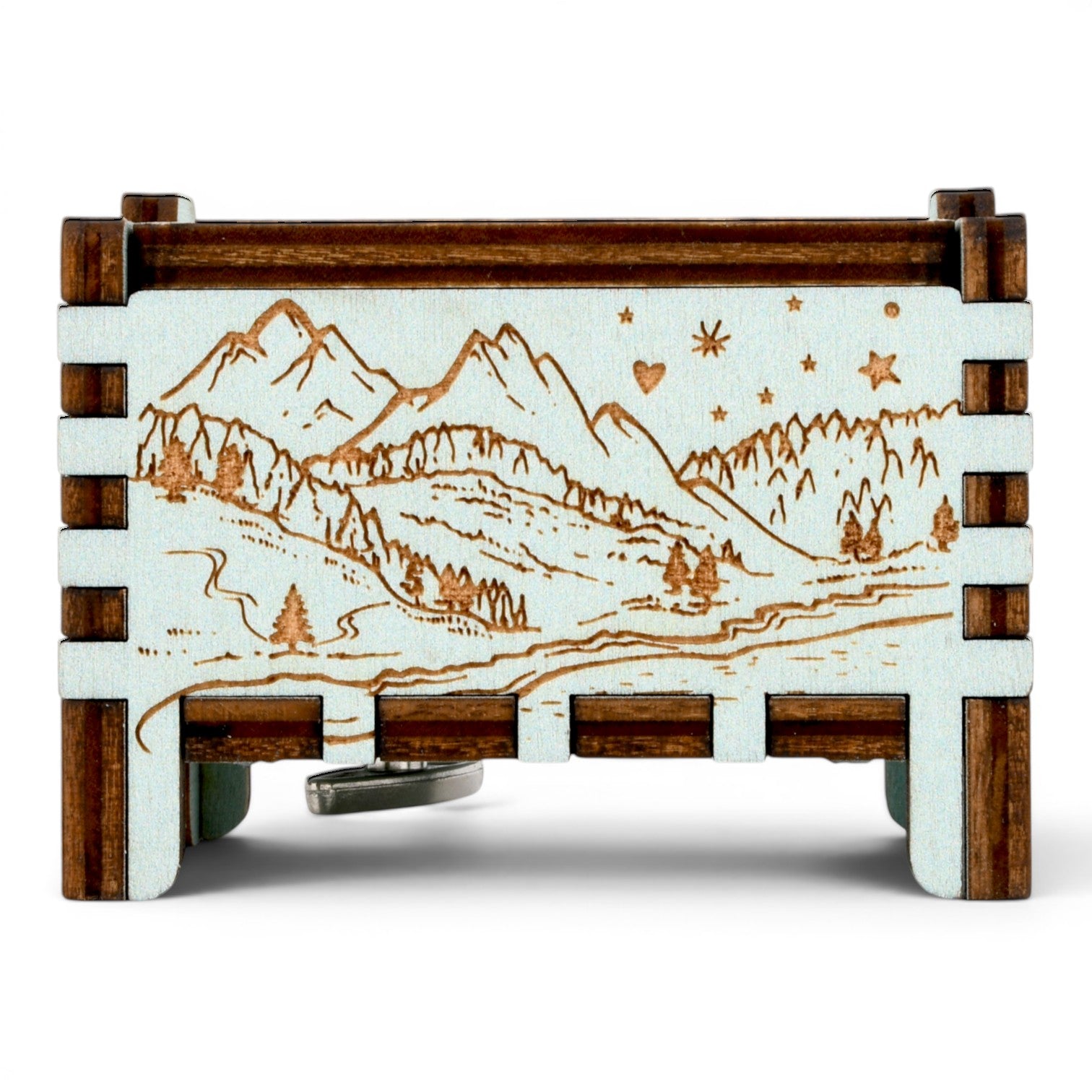 Enchanted Music Boxes teal wooden wind-up music box featuring an engraved alpine mountain landscape and starry night sky.