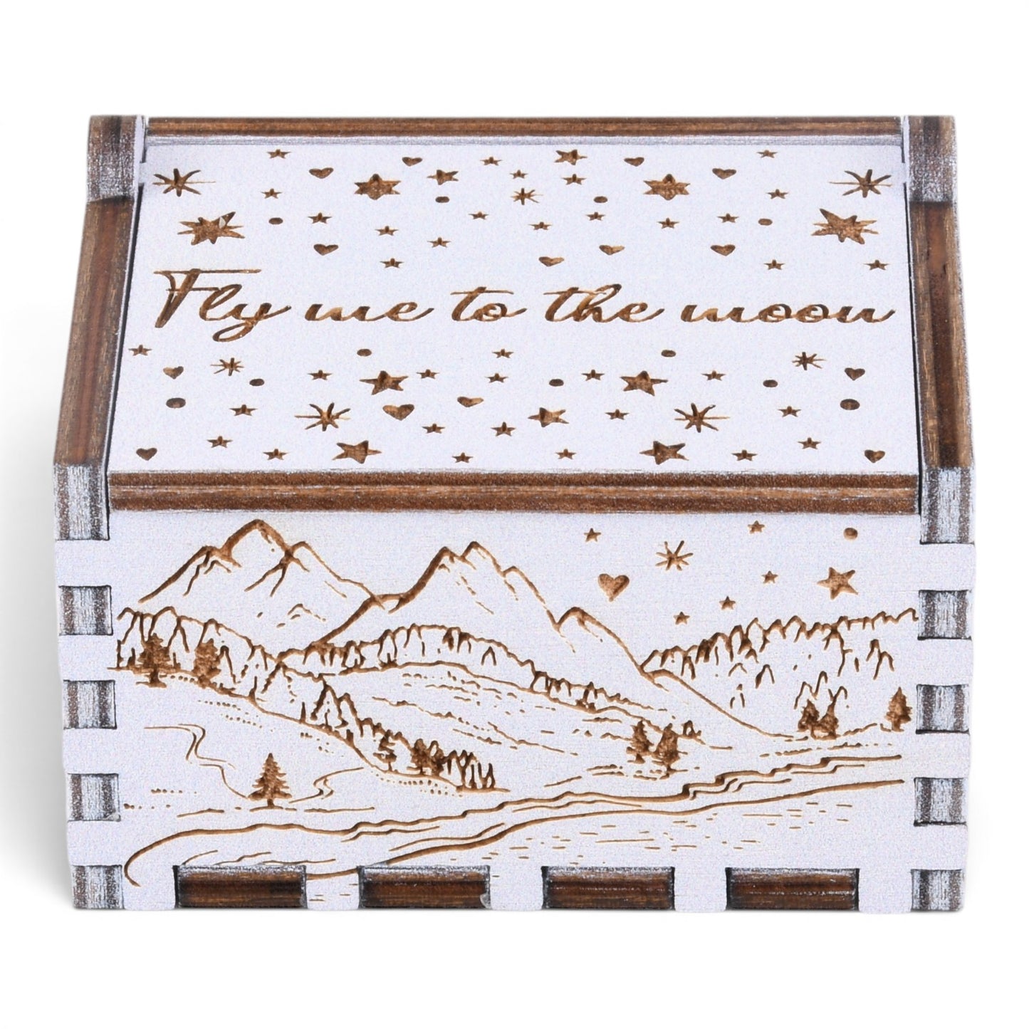Enchanted Music Boxes plywood hand-crank music box with laser-engraved alpine mountain scene and starry night lid design.
