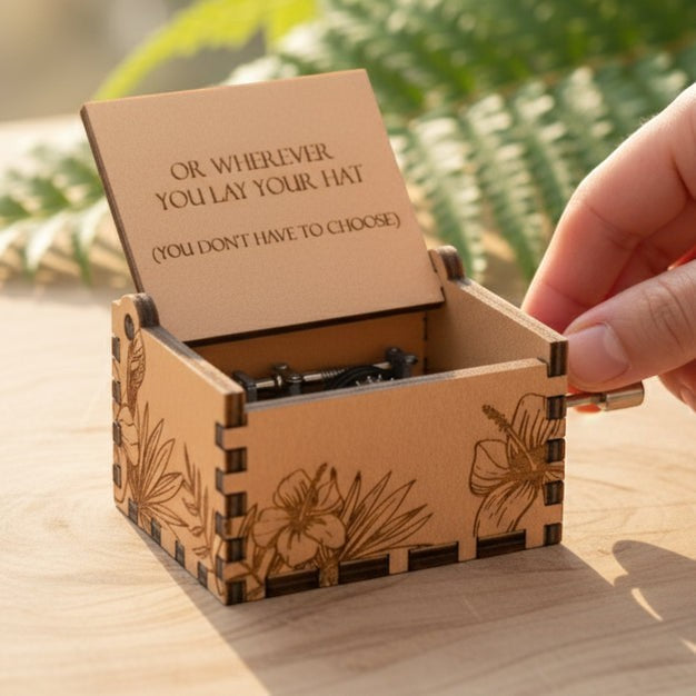 Enchanted Music Boxes tropical plywood music box with laser-engraved hibiscus flowers and custom lid inscription