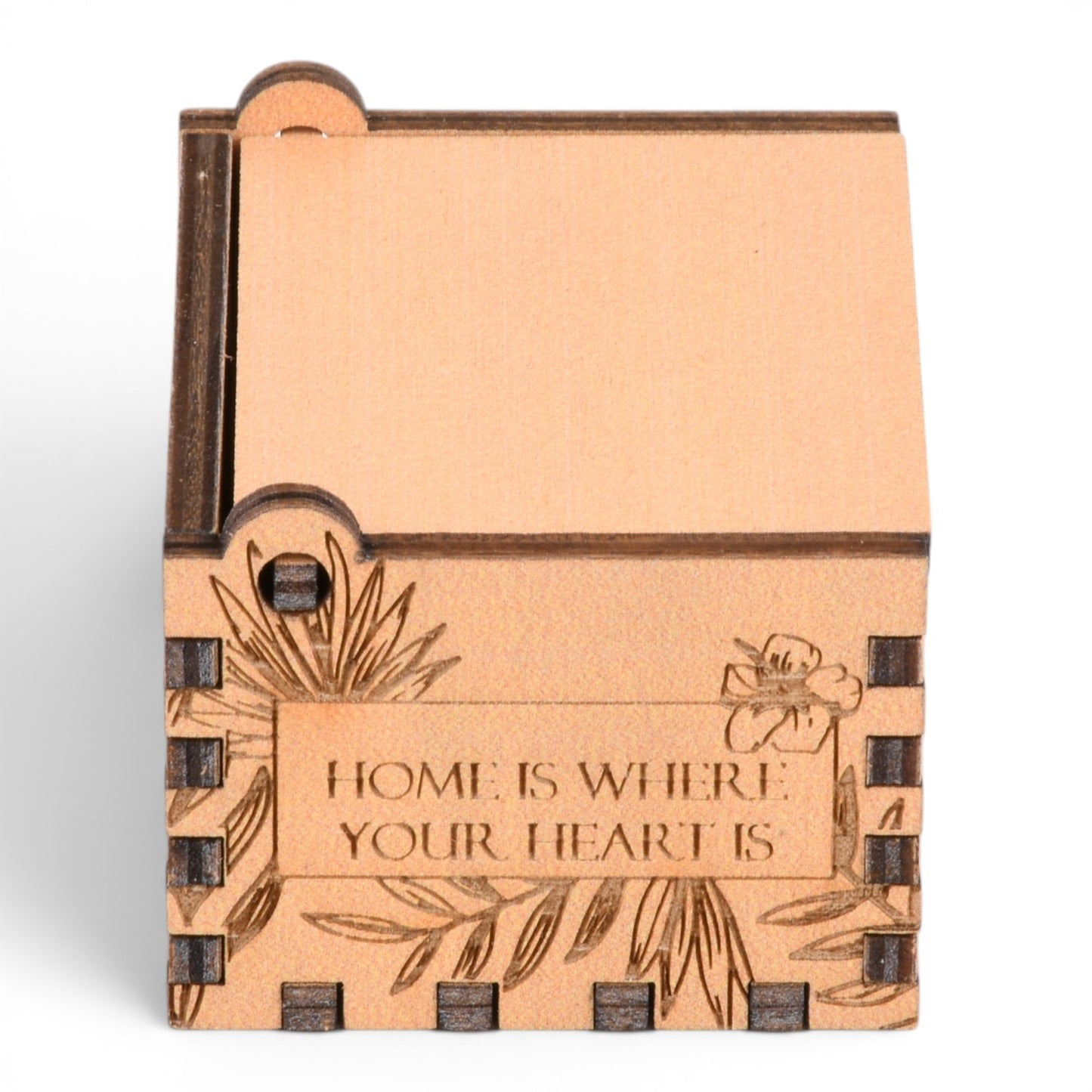 Enchanted Music Boxes plywood hand-crank music box with laser-engraved tropical flowers and Home Is Where Your Heart Is