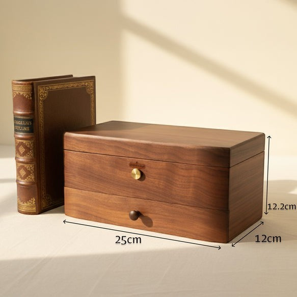 Enchanted Music Boxes 78-note walnut music box with a jewellery drawer, featuring a rich wood grain finish.