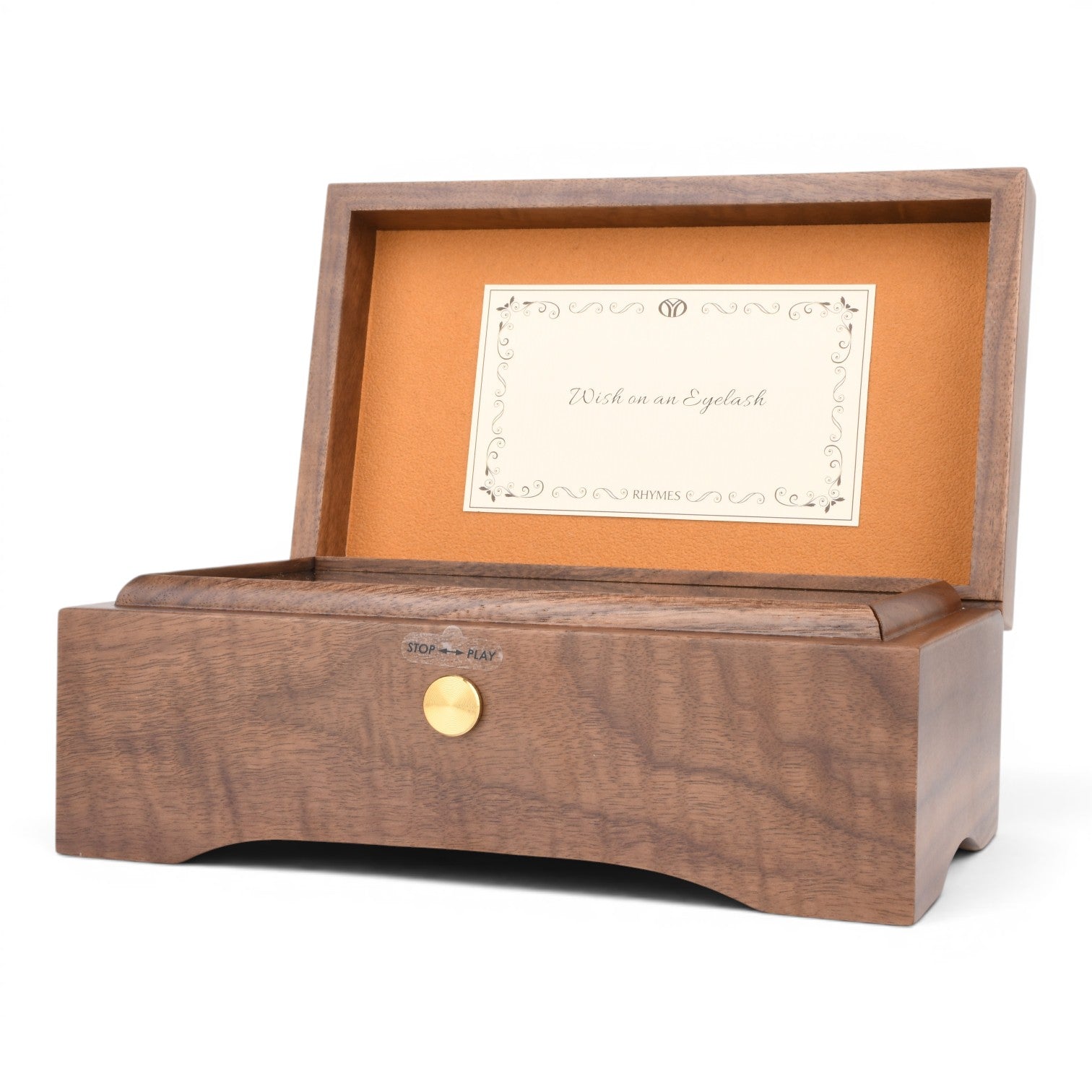 Enchanted Music Boxes 78-note walnut music box with an open lid and gold-toned stop-play button