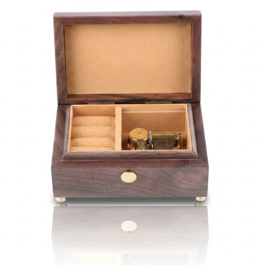 Enchanted Music Boxes walnut wood music box with gold 18-note mechanism and tan velvet interior lining