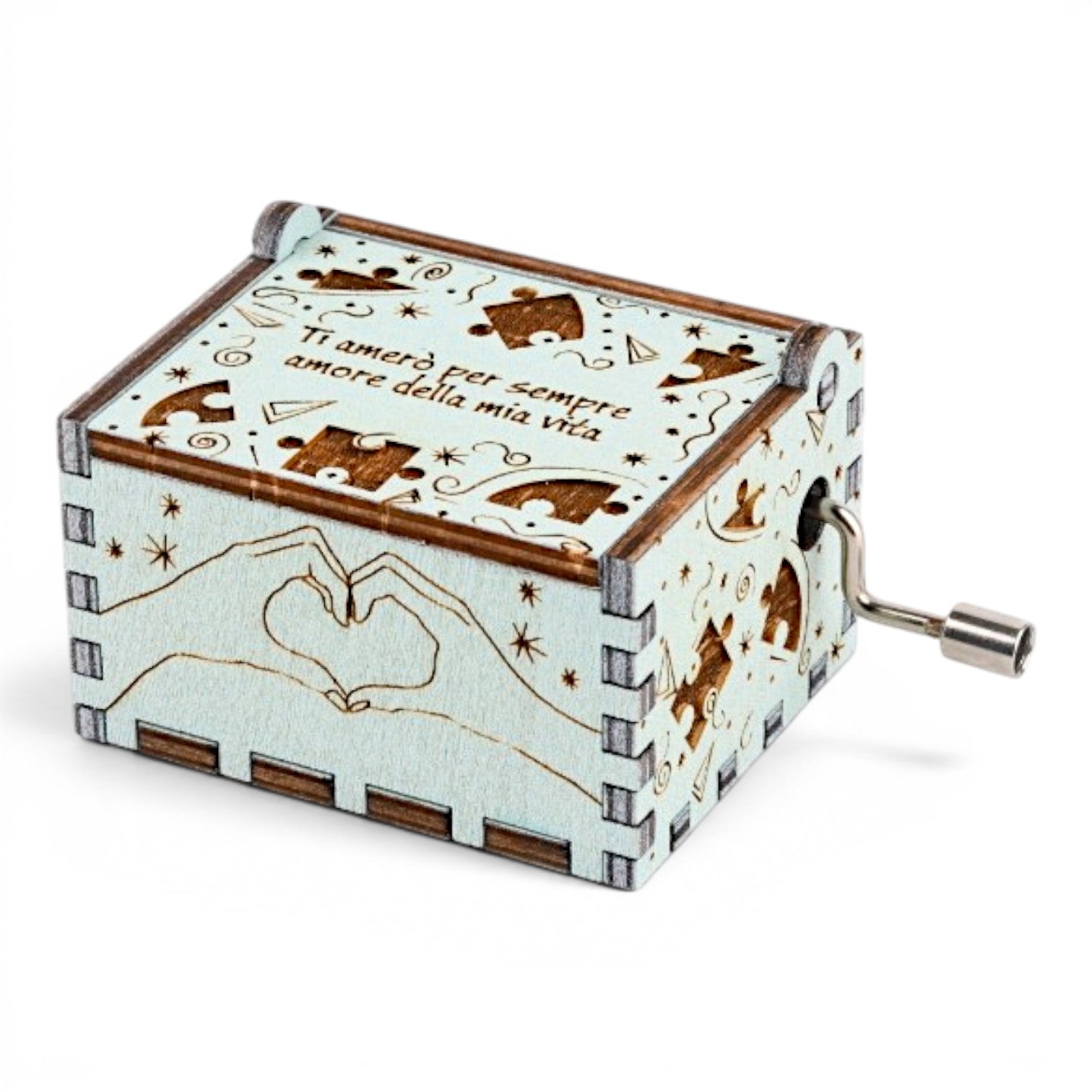 Enchanted Music Boxes wooden hand-crank music box with puzzle piece engravings, heart hands, and Italian text on lid.